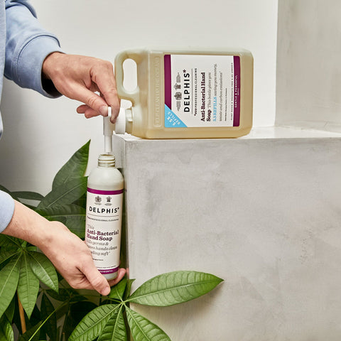 Refilling the Delphis Eco Anti-Bacterial Hand wash with the 2 litre refill