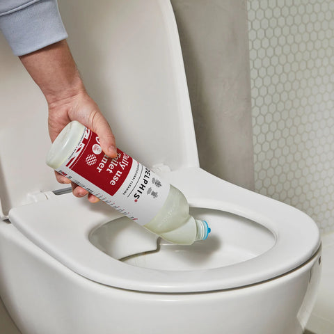 Commercial Toilet Cleaner being poured into toilet